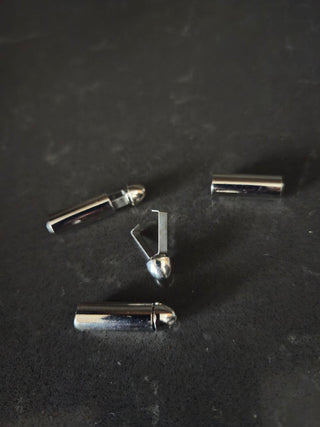 Drawstring aglet